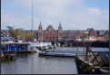 Damrak - Blick auf Amsterdam Centraal
